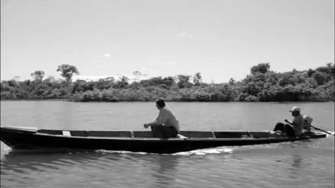 Fig 28 - Jack Maxwell with a boat operator in Peru